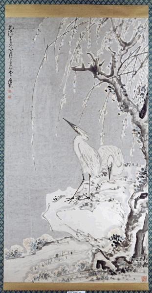 White Egrets On a Bank of Snow Covered Willows 